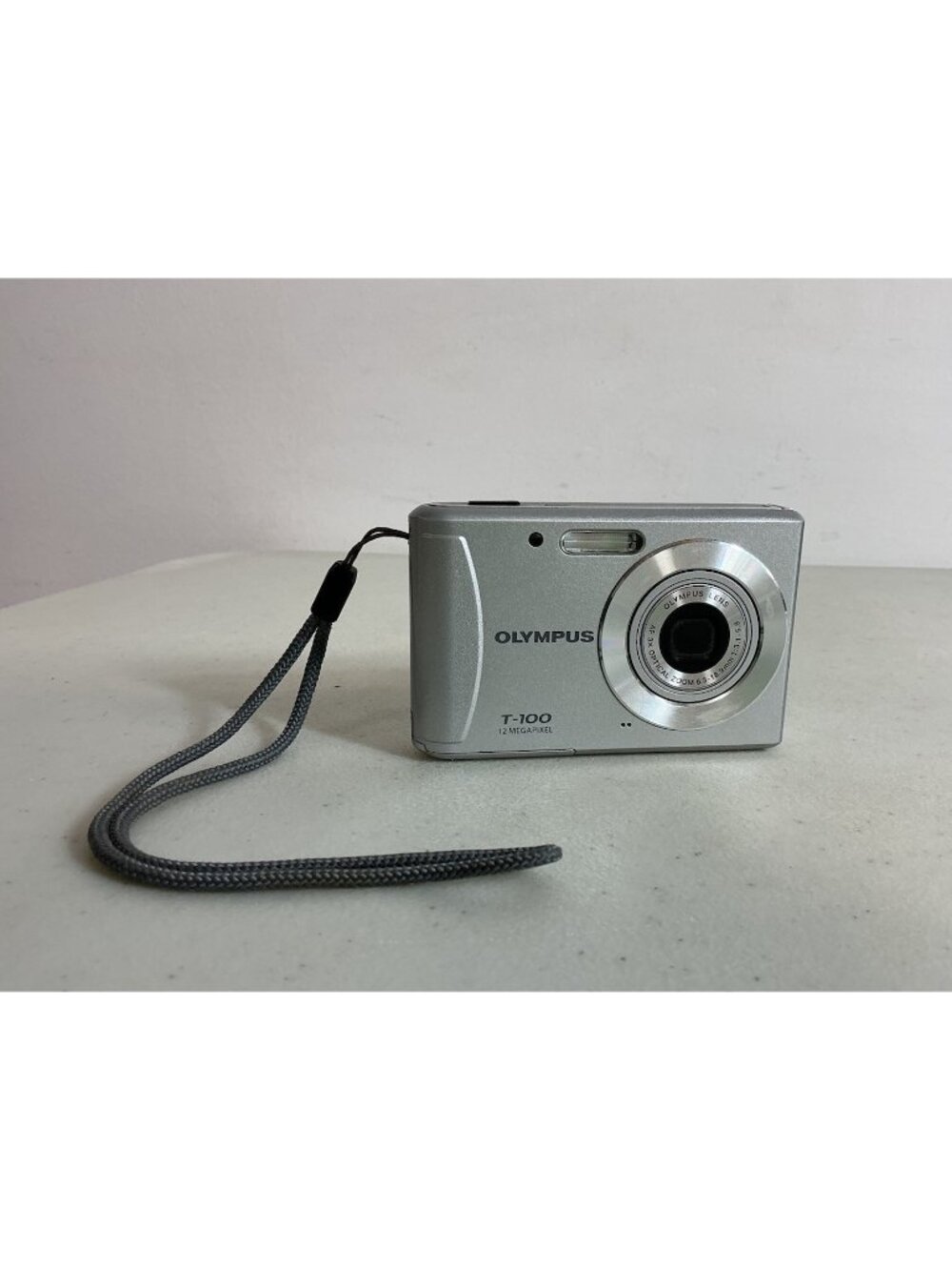 Olympus T-100 12 Megapixel Digital Camera Silver No Charger Works